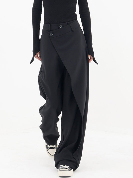 Pantalons larges à jambes asymétriques avec boutons