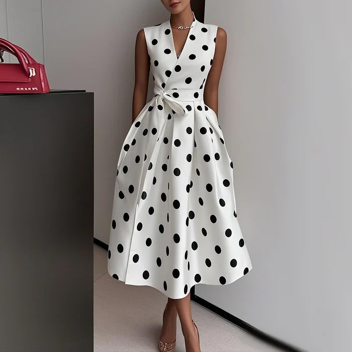 Robe à pois avec nœud élégant