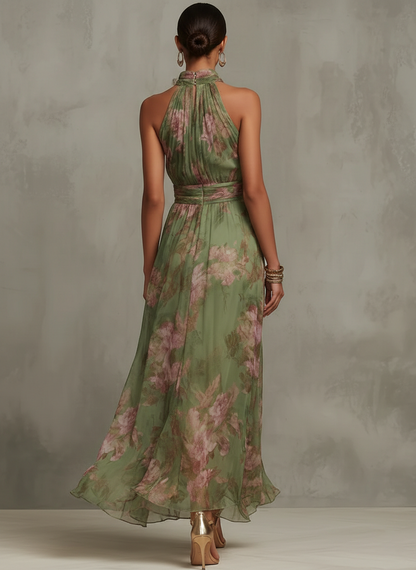 Robe longue en mousseline fleurie verte avec décolleté dos nu