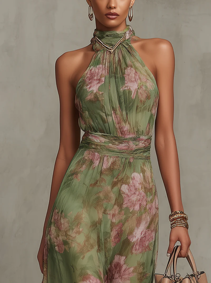 Robe longue en mousseline fleurie verte avec décolleté dos nu