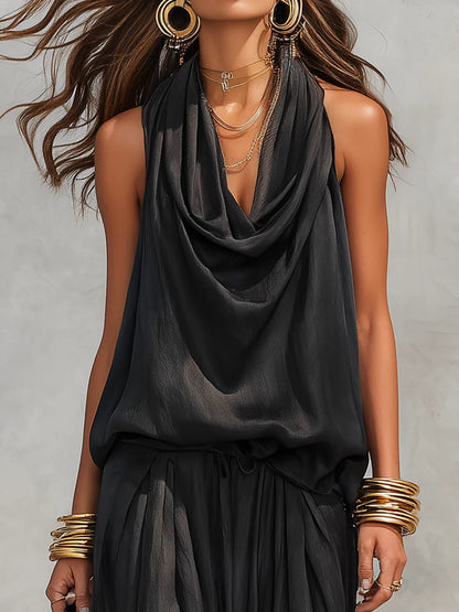 Ensemble top noir sans manches à col halter et pantalon plissé