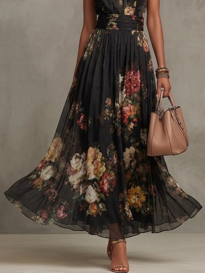 Robe longue en mousseline de soie noire à fleurs avec décolleté dos nu