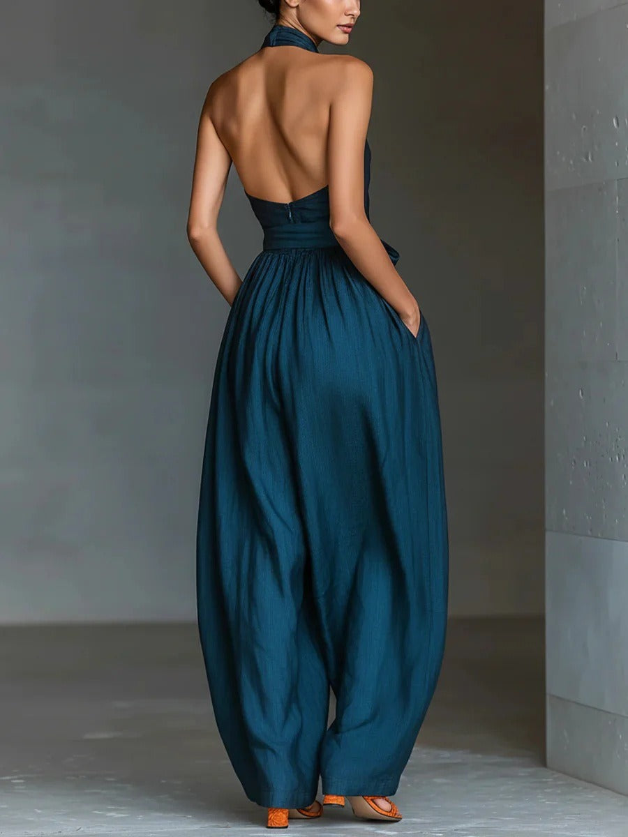 Combinaison femme à col américain croisé, poches, dos nu, taille à nouer et jambes larges