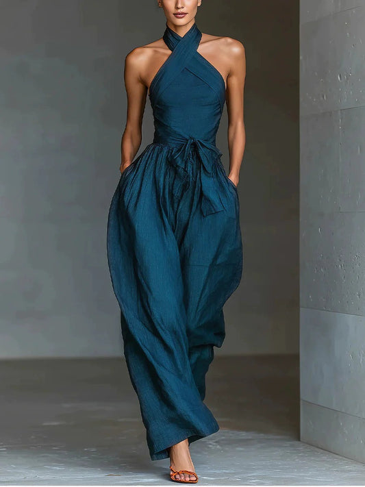 Combinaison femme à col américain croisé, poches, dos nu, taille à nouer et jambes larges